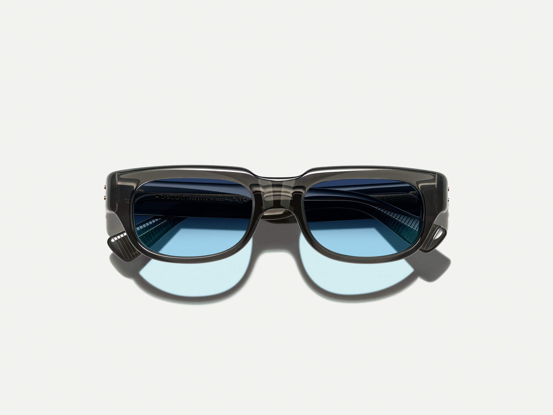 The SHTUP SUN in Grey with Denim Blue Tinted Lenses