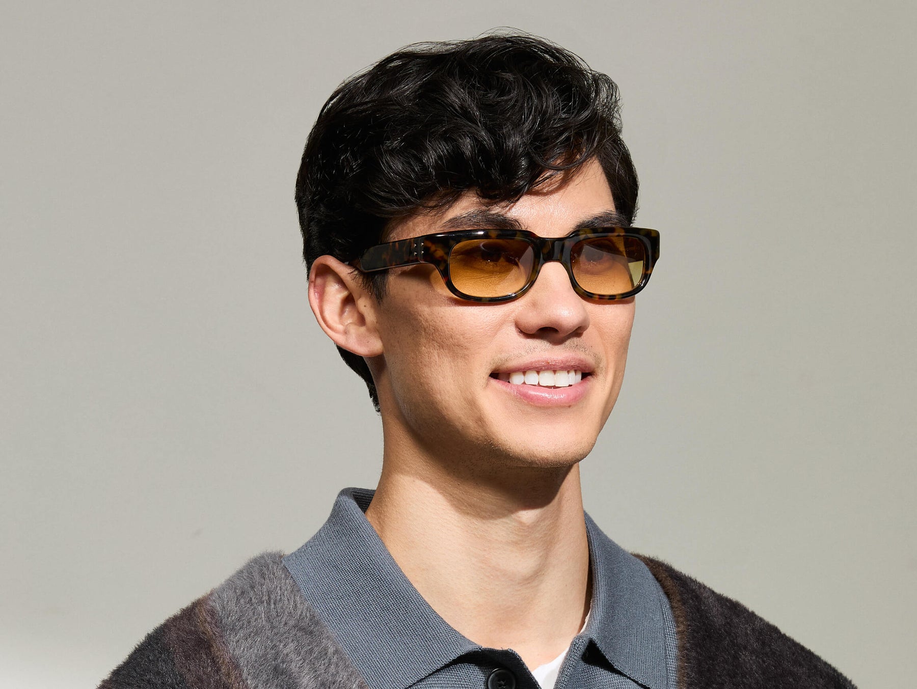 Model is wearing The SHTUP SUN in size 51 in Tortoise with Chestnut Fade Tinted Lenses