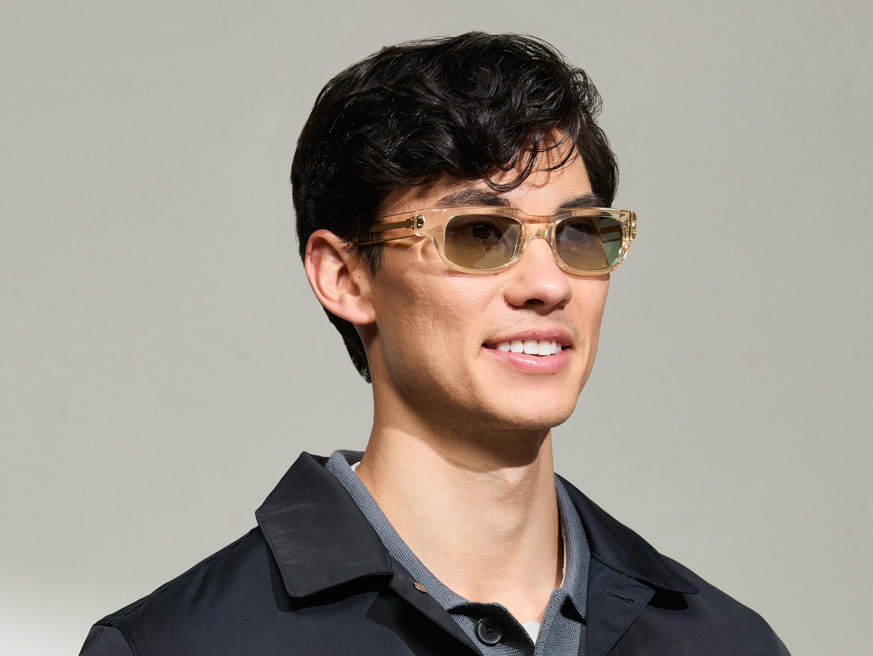 Model is wearing The SHTUP SUN in size 51 in Flesh with Forest Wood Tinted Lenses