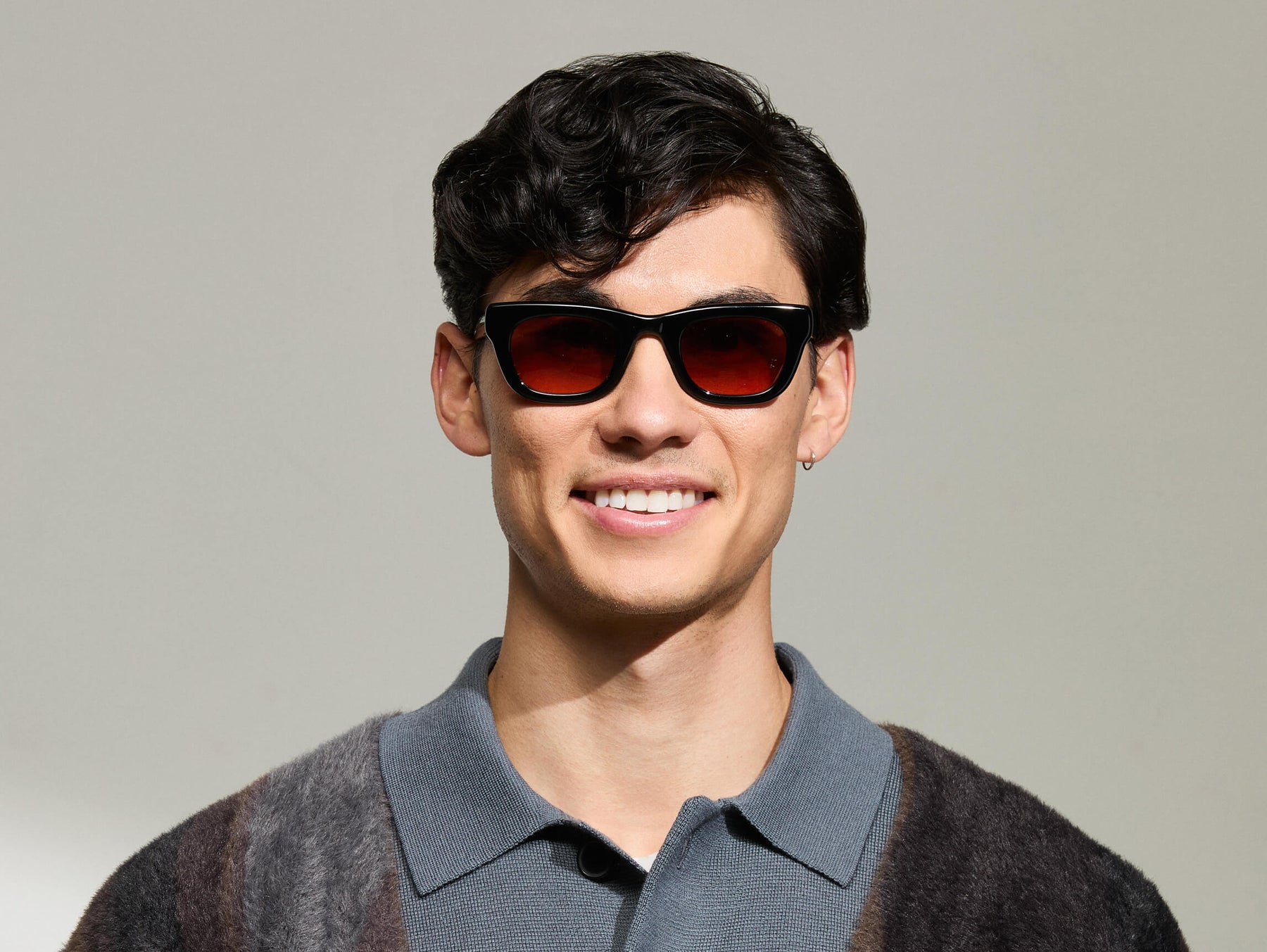 Model is wearing The SPILKES SUN in size 48 in Black with Cabernet Tinted Lenses 