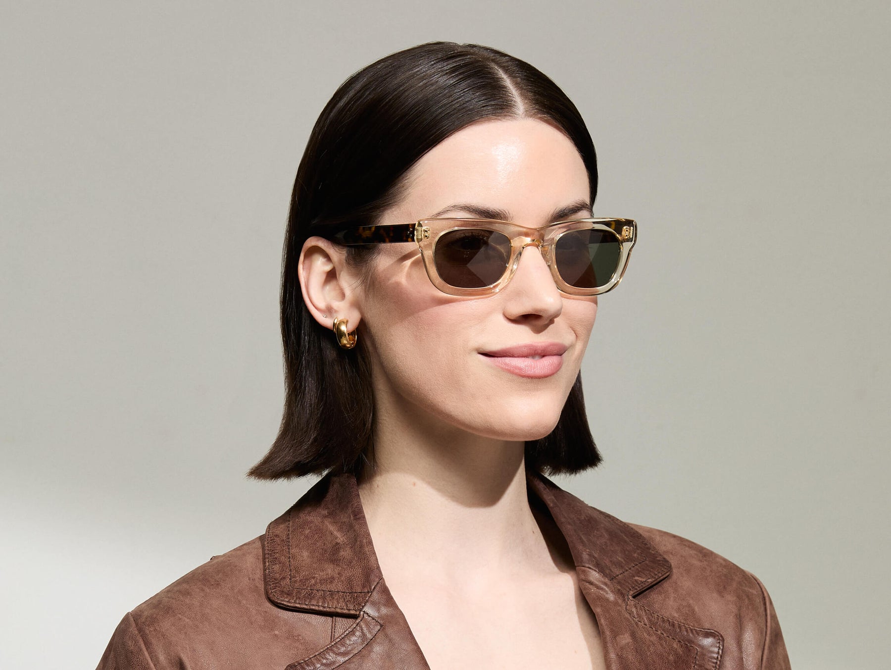 Model is wearing The SPILKES SUN in size 48 in Flesh/Tortoise with G-15 Tinted Lenses 