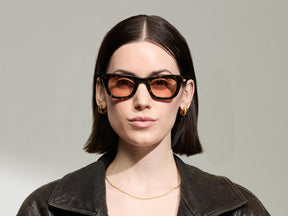 Model is wearing The SPILKES SUN in size 48 in Tortoise with New York Rose Tinted Lenses 