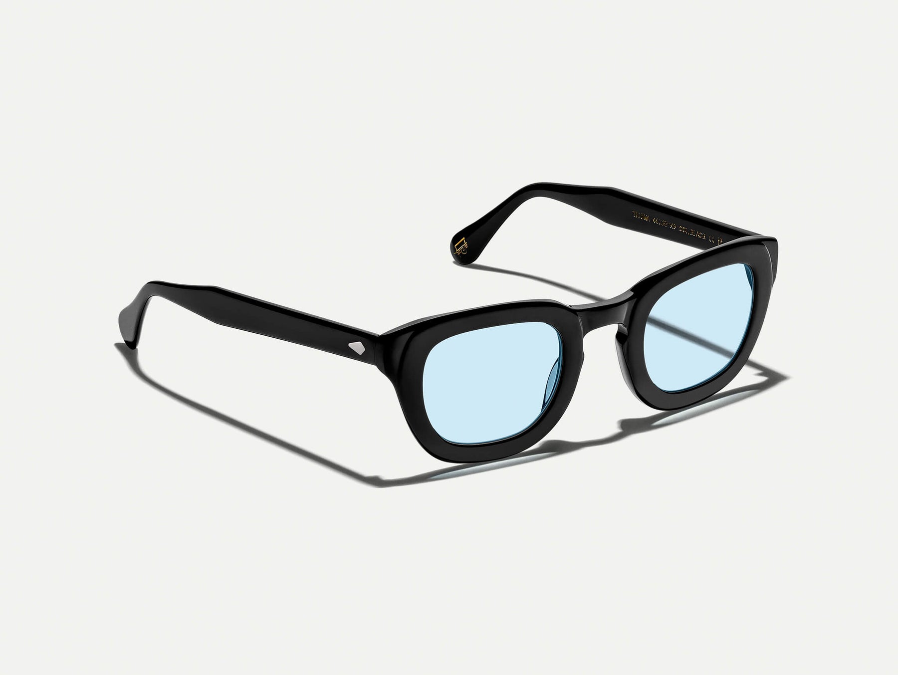 The TELENA in Black with Bel Air Blue Tinted Lenses
