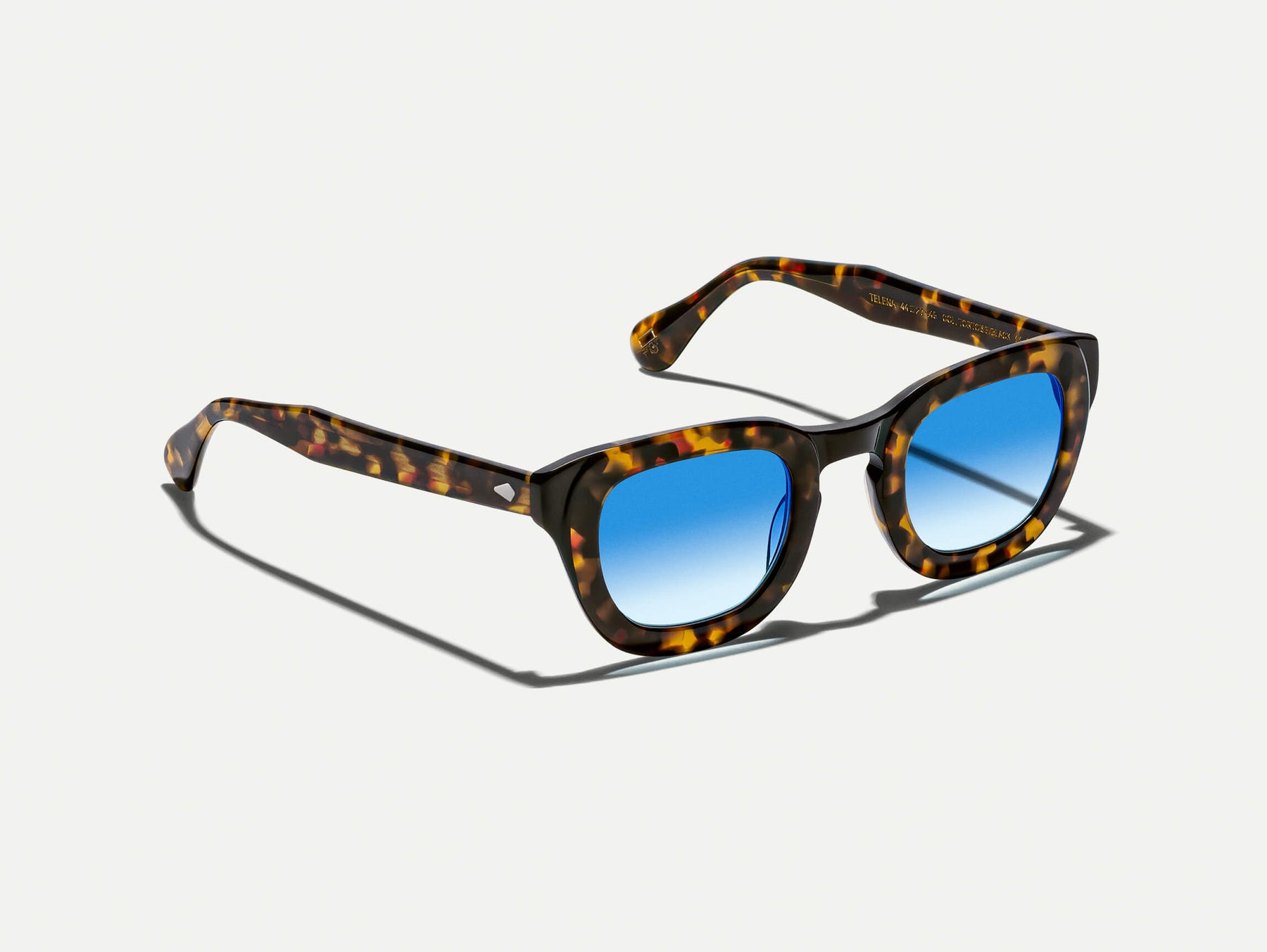 The TELENA in Tortoise/Black with Broadway Blue Fade Tinted Lenses