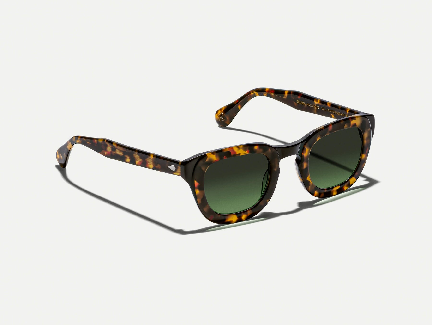 The TELENA in Tortoise/Black with Forest Wood Tinted Lenses