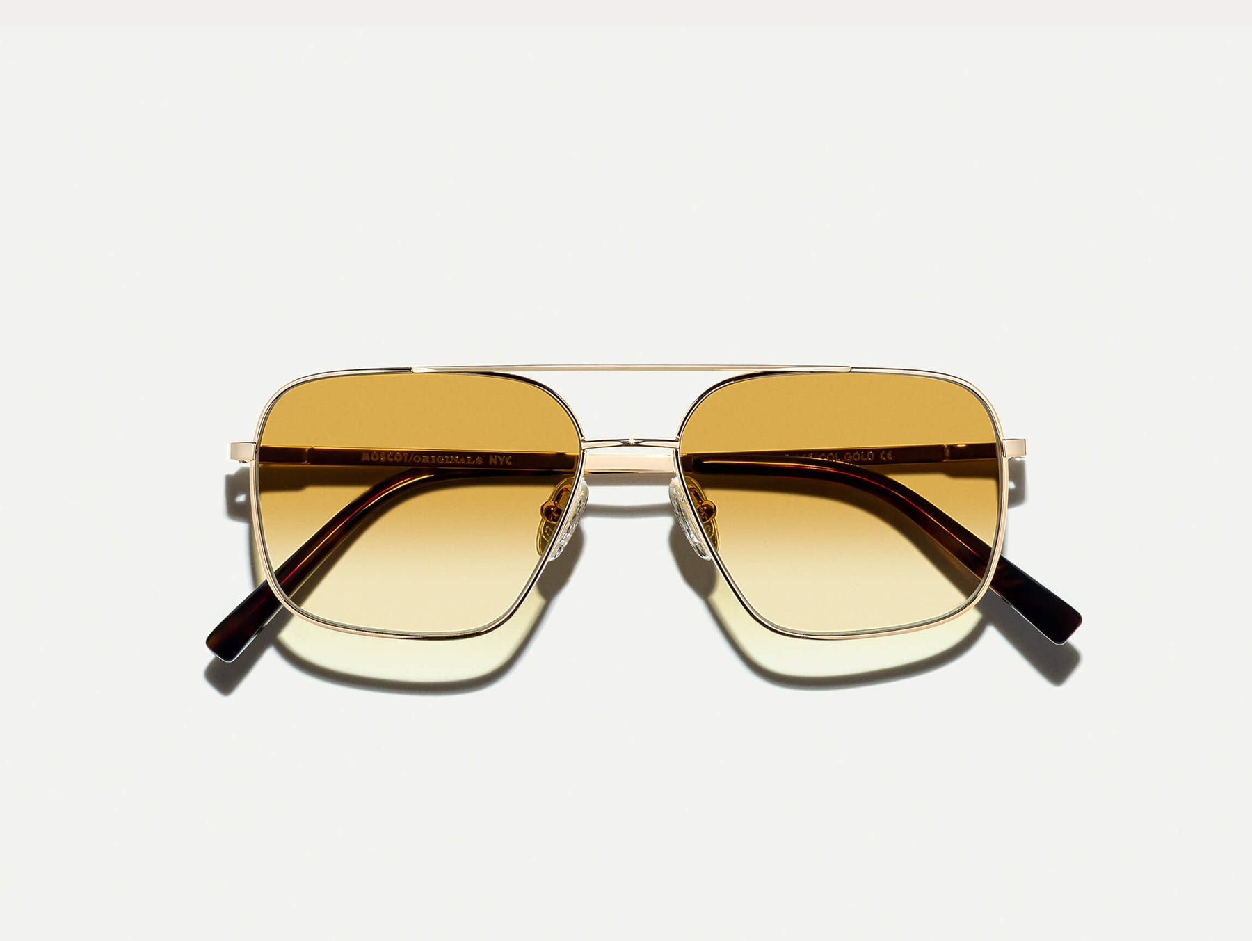 The SHTARKER in Gold with Chestnut Fade Tinted Lenses
