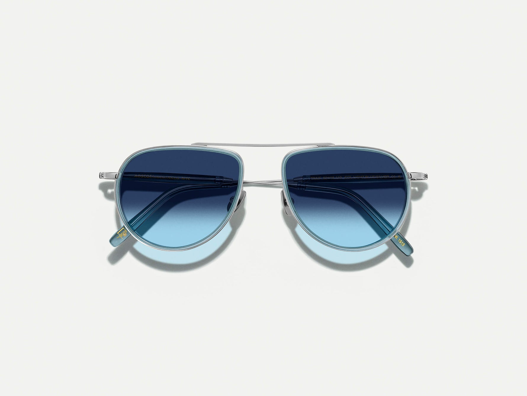 #color_light blue | The TRAIF SUN in Light Blue with Denim Blue Tinted Lenses