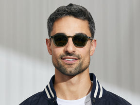 Model is wearing The VANTZ SUN in Pine in size 47 with G-15 Glass Lenses