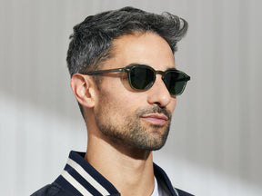 Model is wearing The VANTZ SUN in Pine in size 47 with G-15 Glass Lenses