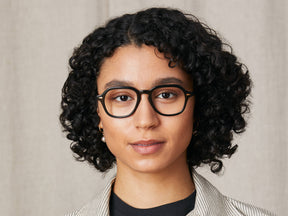 Model is wearing The YENEM in size 50 in Black