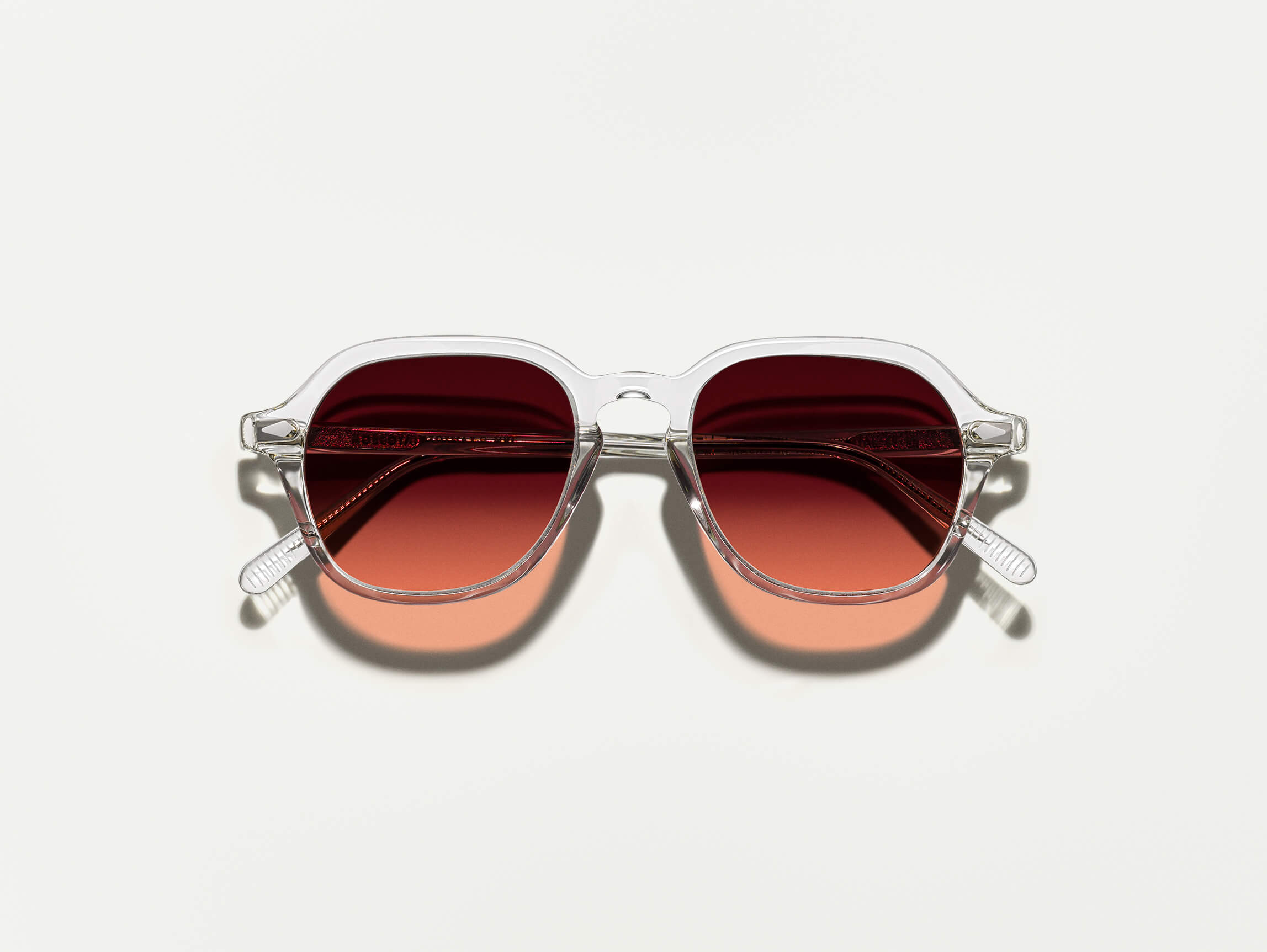 The YENEM SUN in Crystal with Cabernet Tinted Lenses