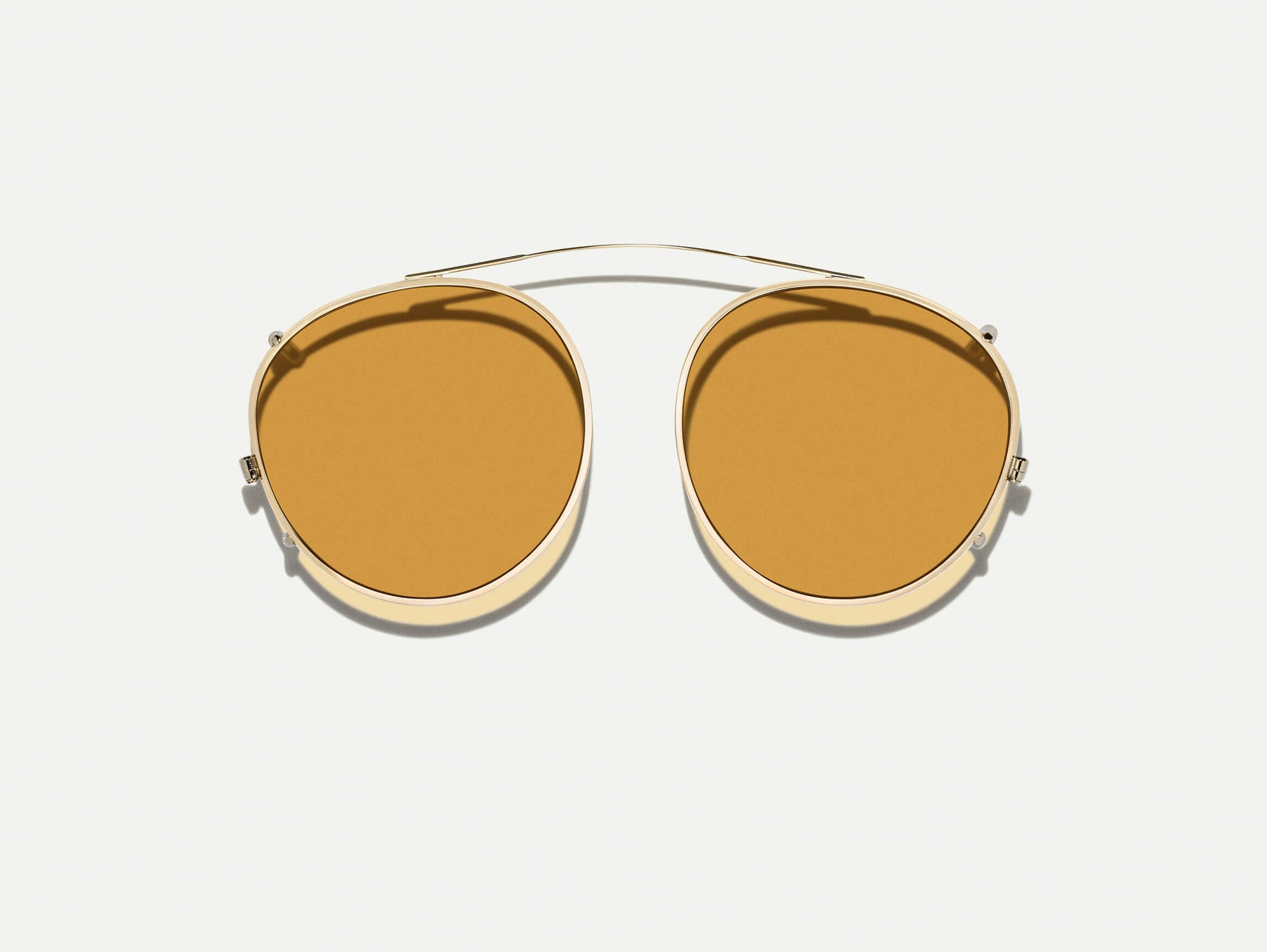 The ZEV CLIP  in Gold with Amber Tinted Lenses