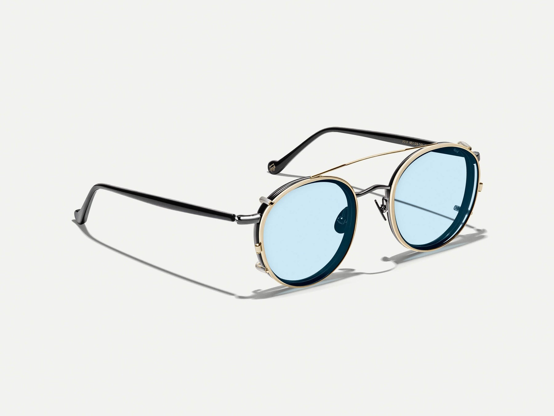 The ZEV CLIP  in Gold with Bel Air Blue Tinted Lenses