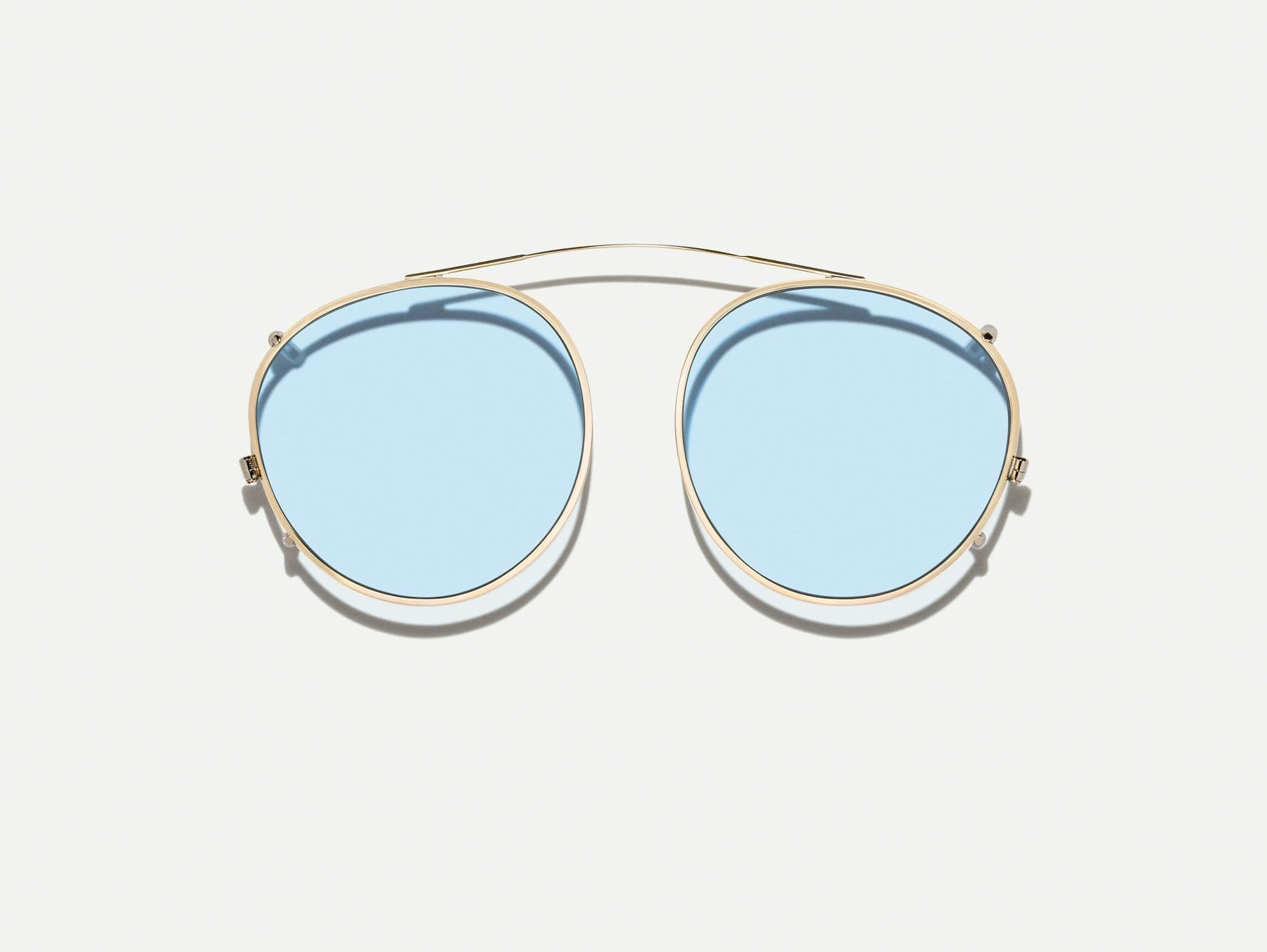 The ZEV CLIP  in Gold with Bel Air Blue Tinted Lenses