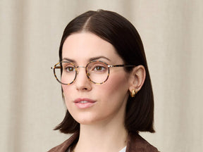 Model is wearing The ZEV in size 49 in Tortoise