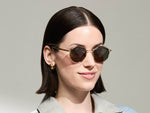 Model is wearing The ZEV SUN in Bamboo in size 49 with G-15 Tinted Lenses