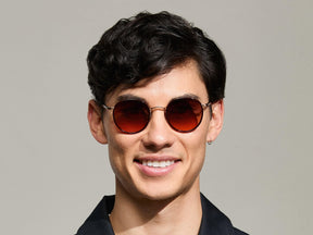 Model is wearing The ZEV SUN in Burgundy in size 49 with Cabernet Tinted Lenses