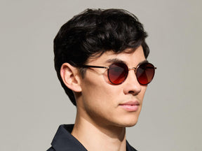 Model is wearing The ZEV SUN in Burgundy in size 49 with Cabernet Tinted Lenses