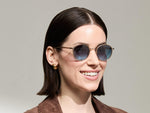 Model is wearing The ZEV SUN in Cinnamon in size 49 with Denim Blue Tinted Lenses