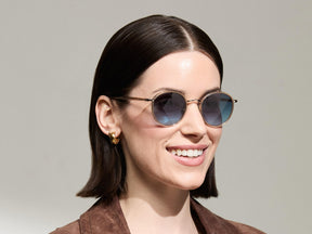 Model is wearing The ZEV SUN in Cinnamon in size 49 with Denim Blue Tinted Lenses