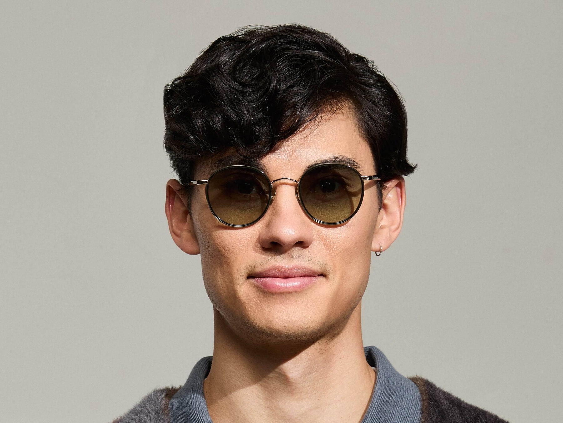 Model is wearing The ZEV SUN in Dark Green in size 49 with Forest Wood Tinted Lenses