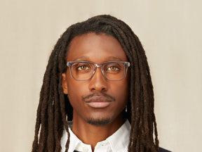 Model is wearing The ZISSEL in size 49 in Light Grey