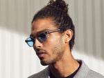 Model is wearing The LEMTOSH in Light Grey in size 46 with Celebrity Blue Tinted Lenses