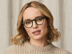 Model is wearing The MILTZEN in size 49 in Emerald