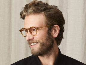 Model is wearing The MILTZEN in Blonde in size 46 with Blue Protect Lenses