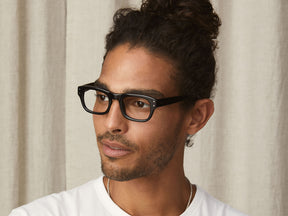 Model is wearing The NEBB in size 48 in Black