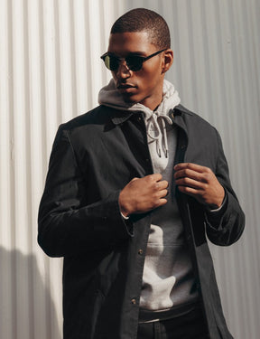 Model is wearing The AIDIM SUN in Black/Silver in size 46 with G-15 Glass Lenses