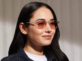 Model is wearing The ARTHUR in Crystal in size 48 with New York Rose Tinted Lenses