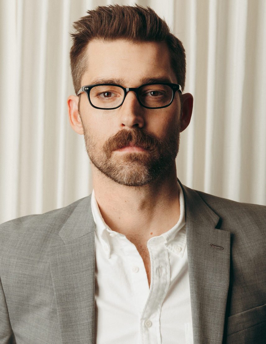 Model is wearing The BRANDON in size 50 in Black