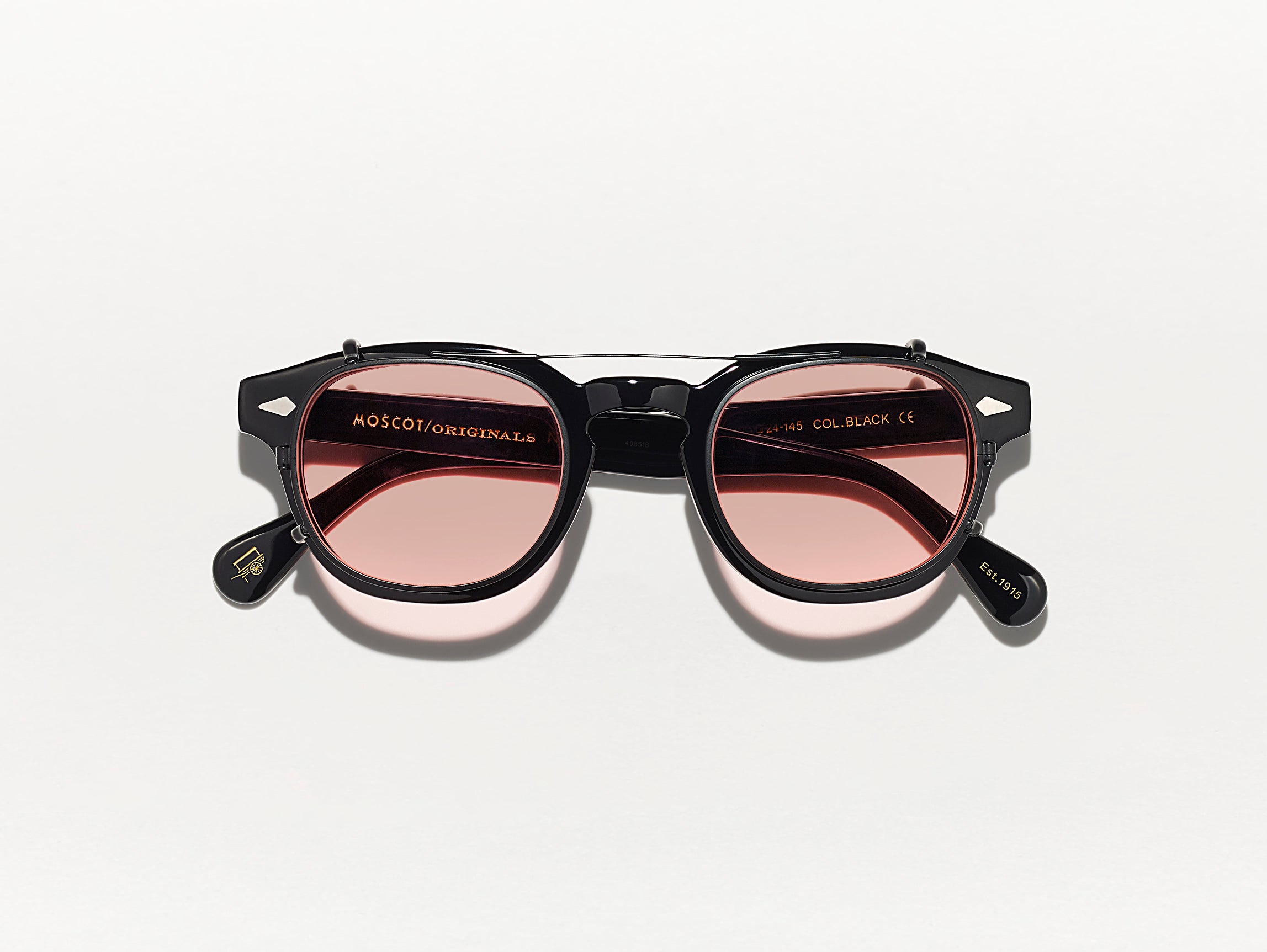 The CLIPTOSH in Matte Black with New York Rose Lenses