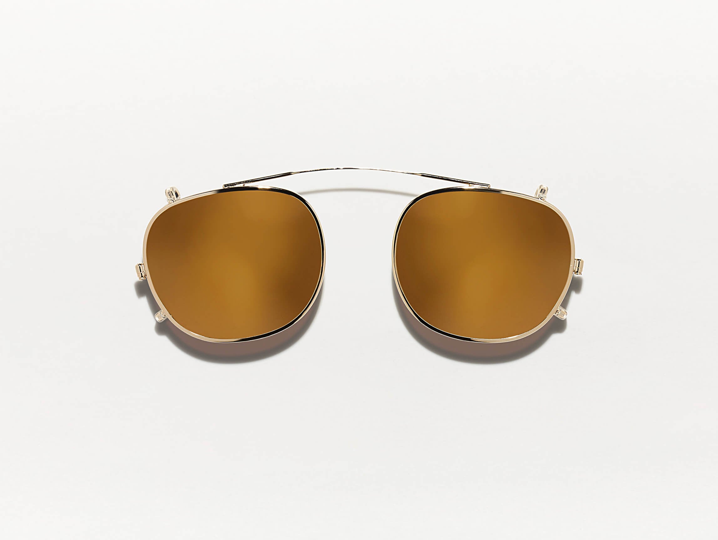 The CLIPTOSH in Gold with Gold Mirror Lenses