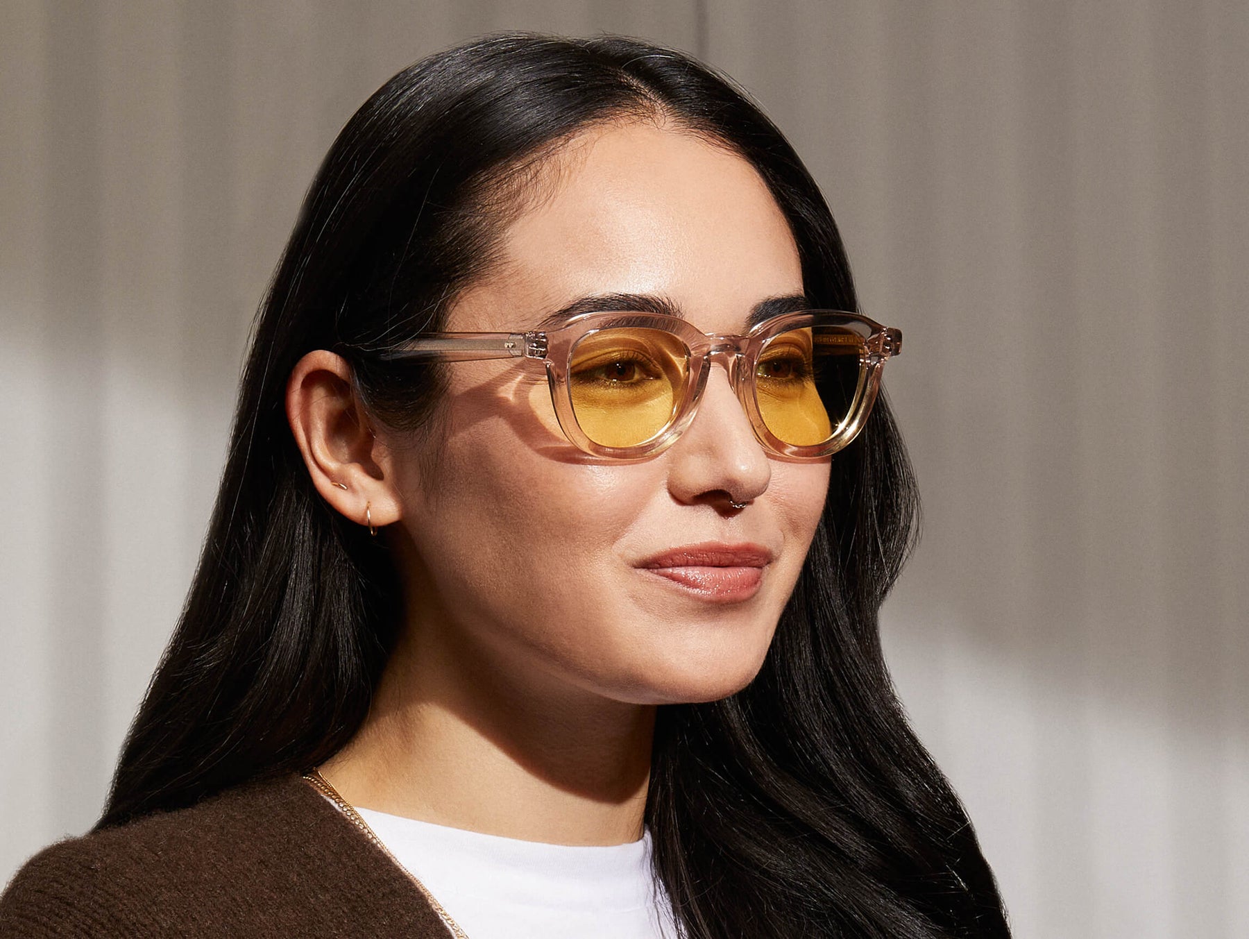 Model is wearing The DAVHEN in Mist in size 47 with Pastel Yellow Tinted Lenses