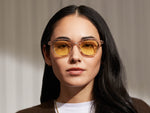 Model is wearing The DAVHEN in Mist in size 47 with Pastel Yellow Tinted Lenses