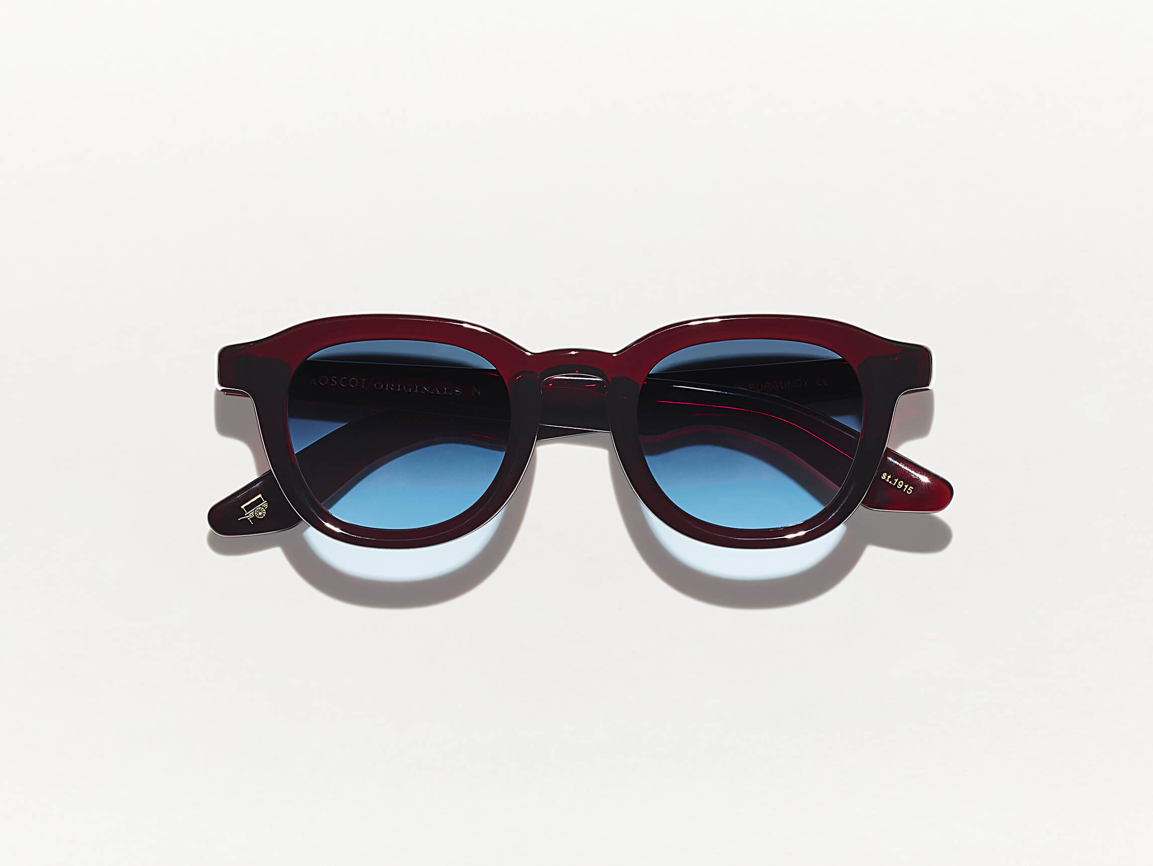 #color_burgundy | The DAHVEN in Burgundy with Denim Blue Tinted Lenses