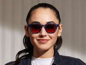 Model is wearing The DAHVEN in Sapphire in size 47 with Cabernet Tinted Lenses