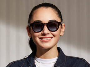 Model is wearing The DAHVEN in Burgundy in size 47 with Denim Blue Tinted Lenses