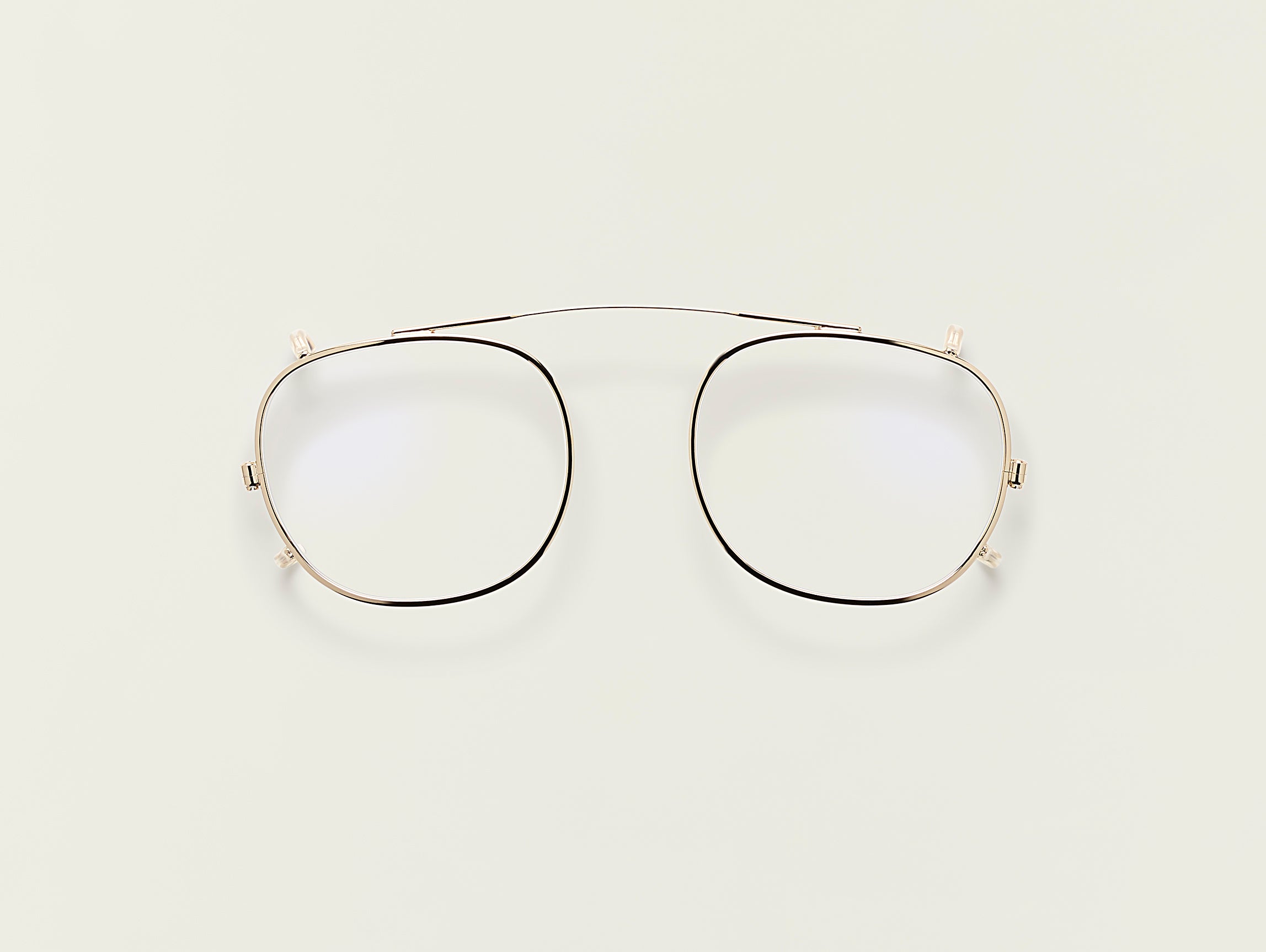 The CLIPTOSH in Gold with Blue Protect Lenses