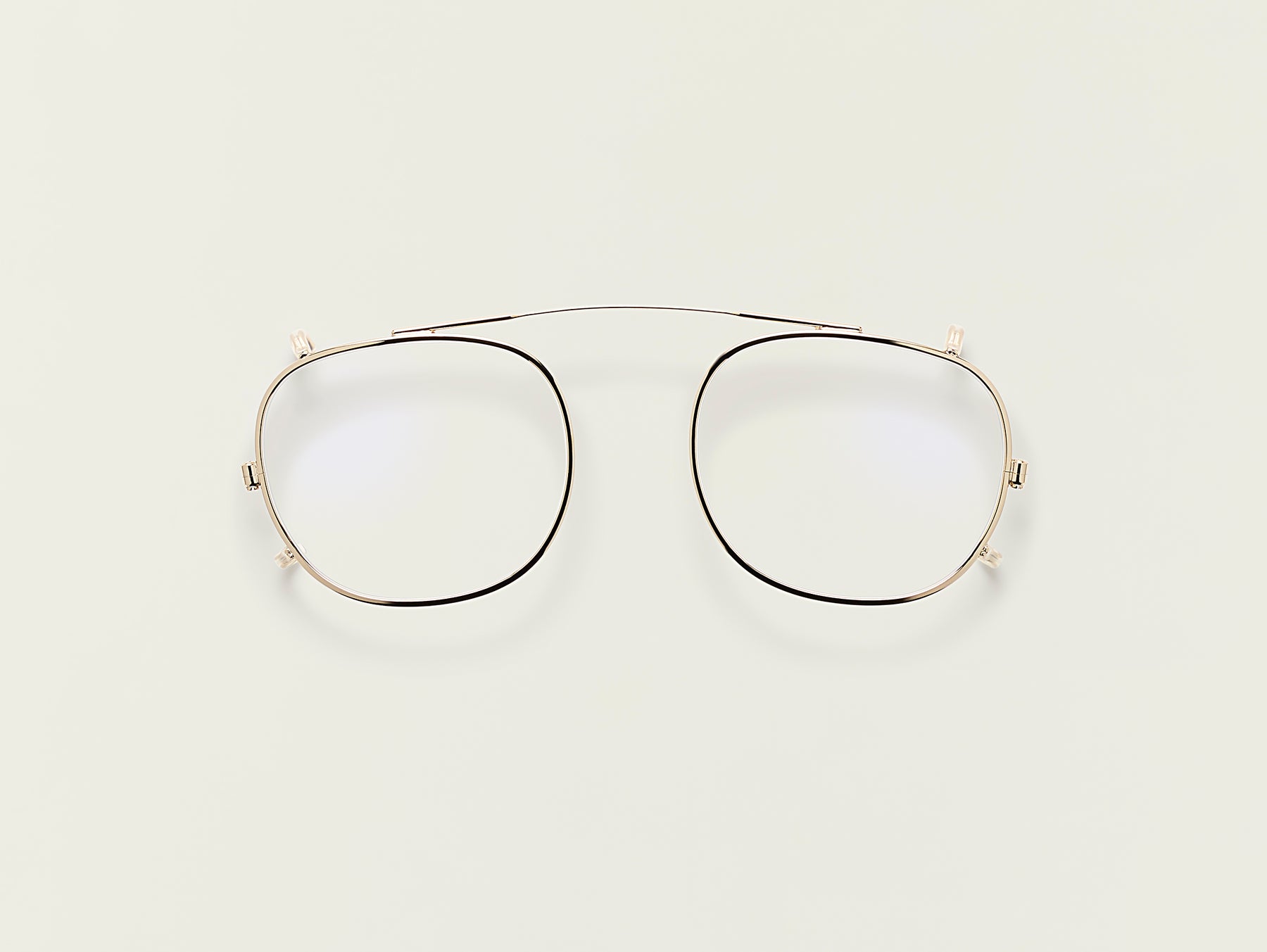 The CLIPTOSH in Gold with Blue Protect Lenses