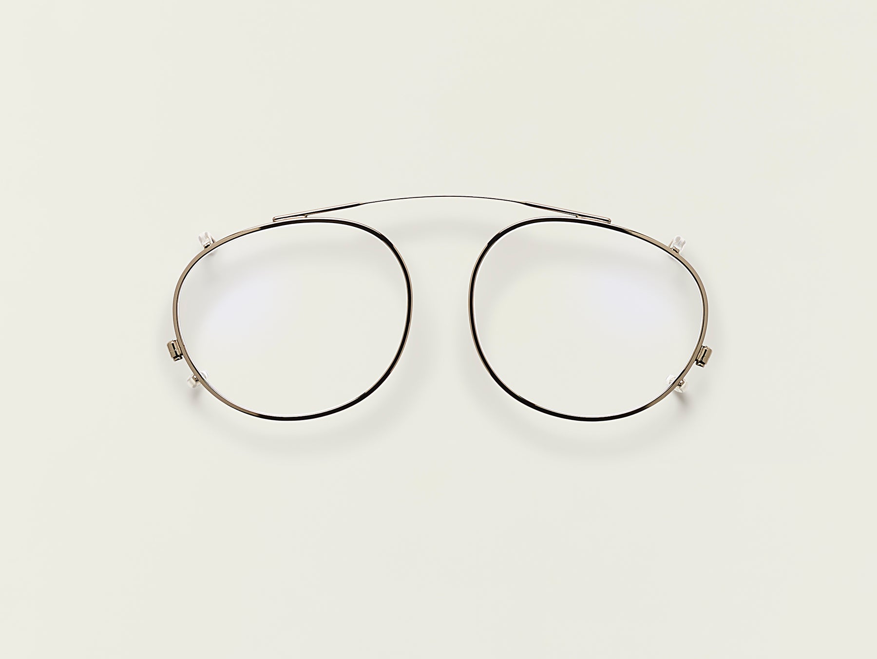 The FRANKIE CLIP in Brass with Blue Protect Lenses