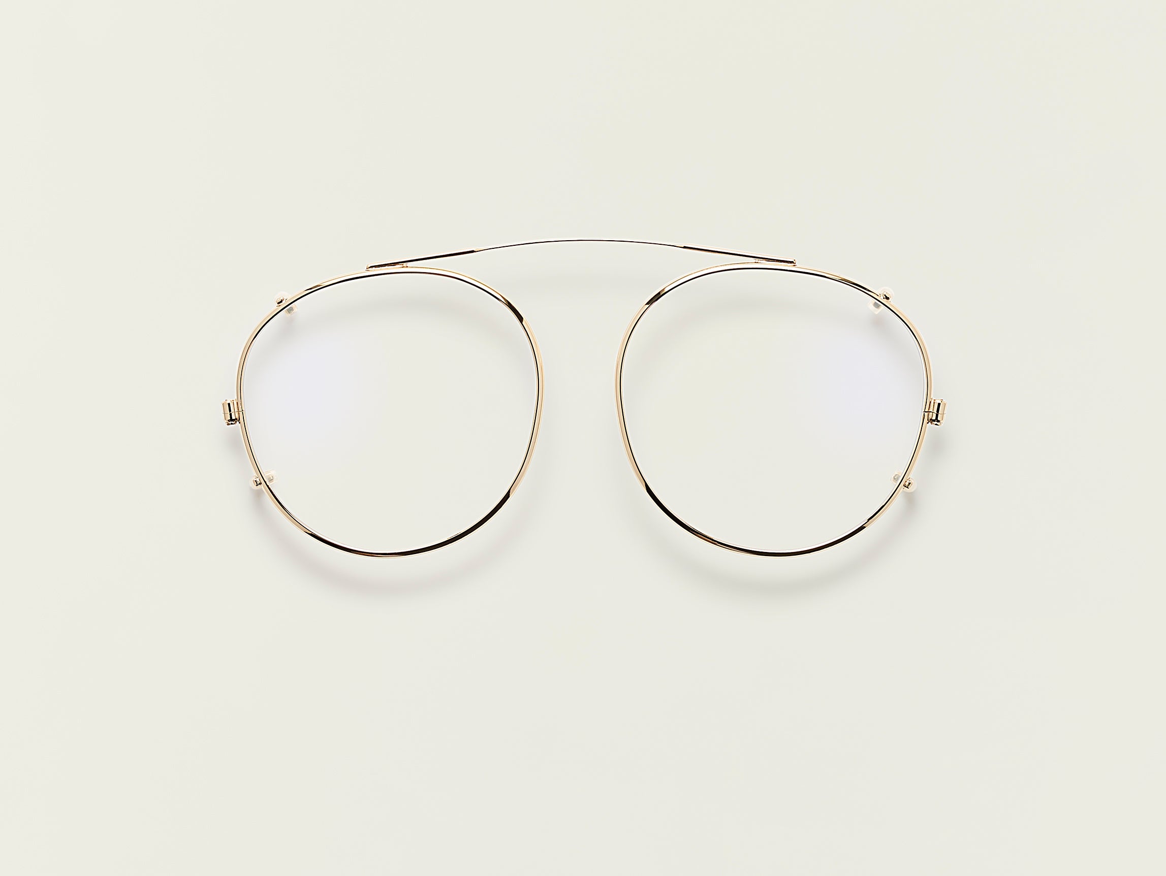 #color_gold | The ZEV CLIP in Gold with Blue Protect Lenses