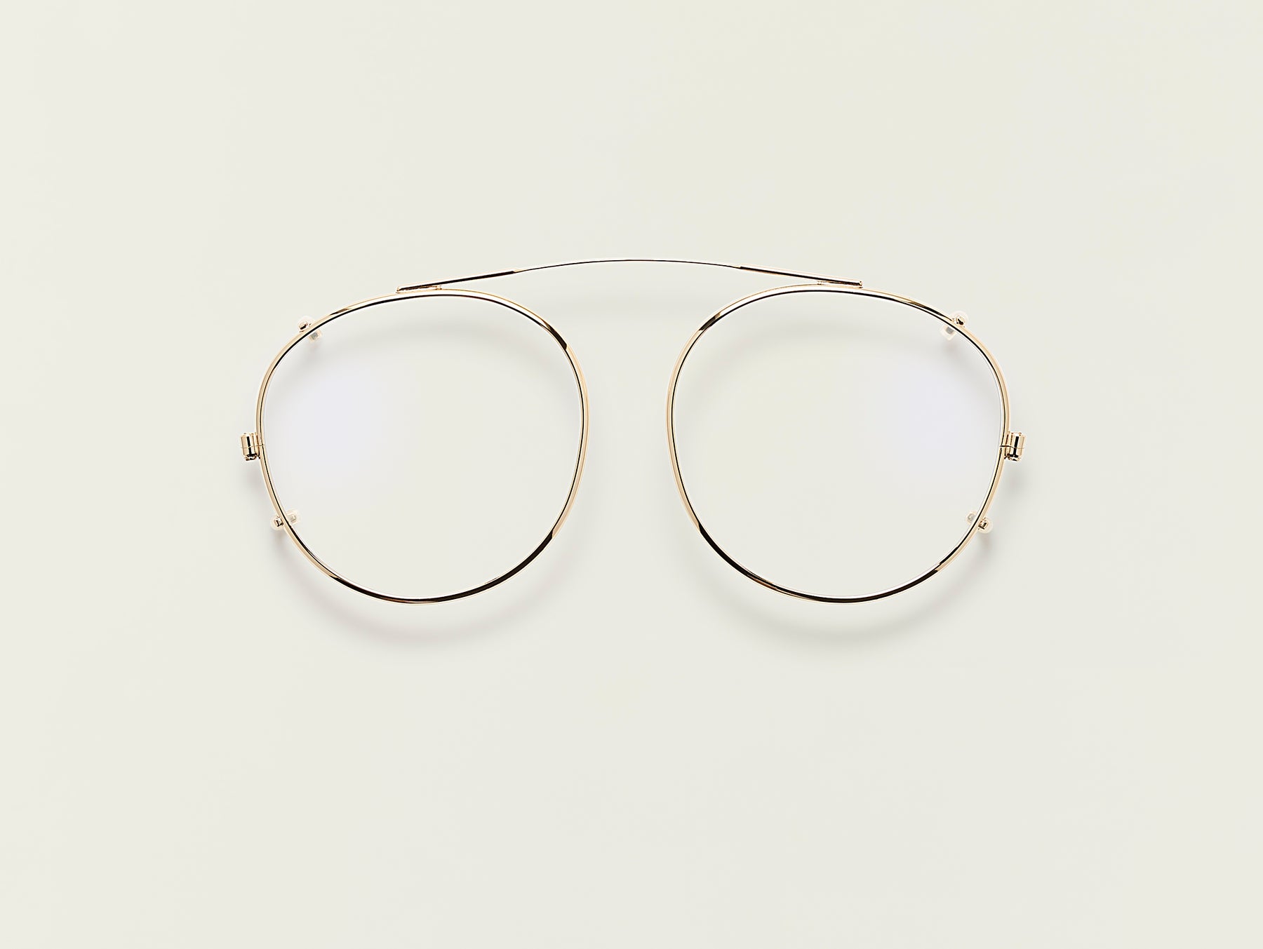 The ZEV CLIP in Gold with Blue Protect Lenses