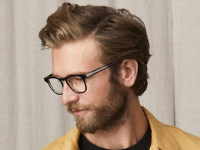 Model is wearing The DUDEL in size 48 in Black-Crystal