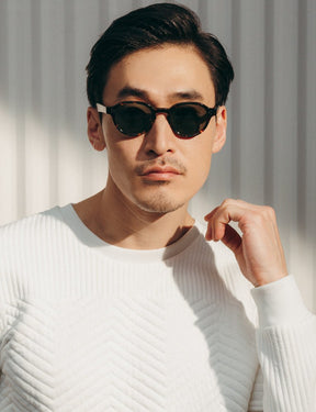 Model is wearing The EZRA SUN in Dark Havana in size 47 with G-15 Glass Lenses