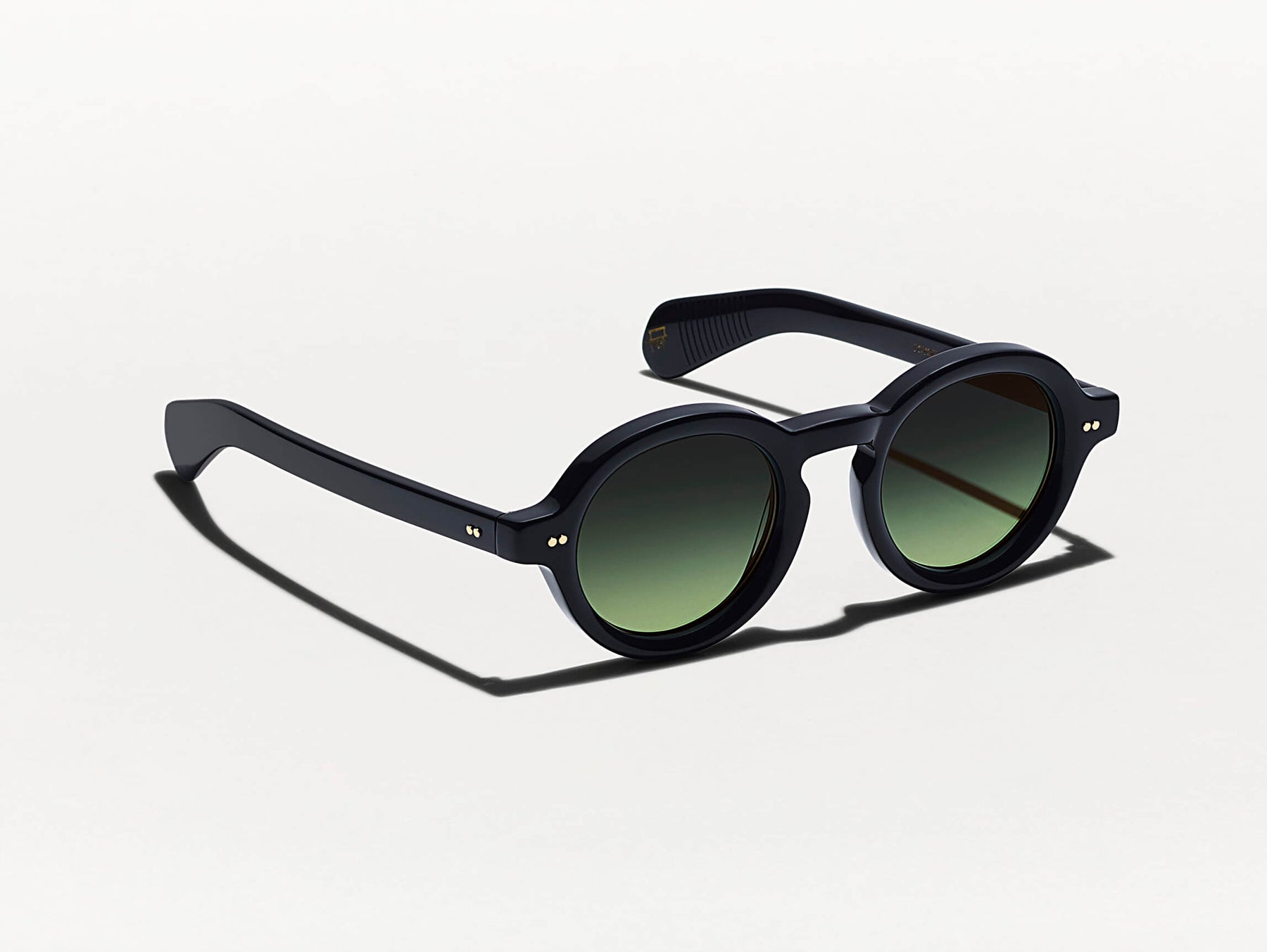 The FOYGEL SUN in Black with Forest Wood Tinted Lenses