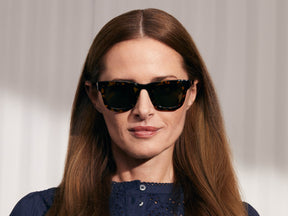 Model is wearing The FRITZ SUN in Tortoise/Black in size 47 with G-15 Glass Lenses