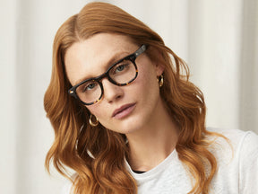 Model is wearing The GELT in Tortoise in size 46 with Blue Protect Lenses